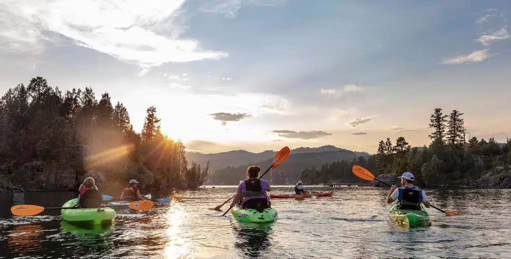 Family on Tour on Flathead Lake in Somers Bay toward Wild Horse Island with Tour Glacier | Sea Me Paddle