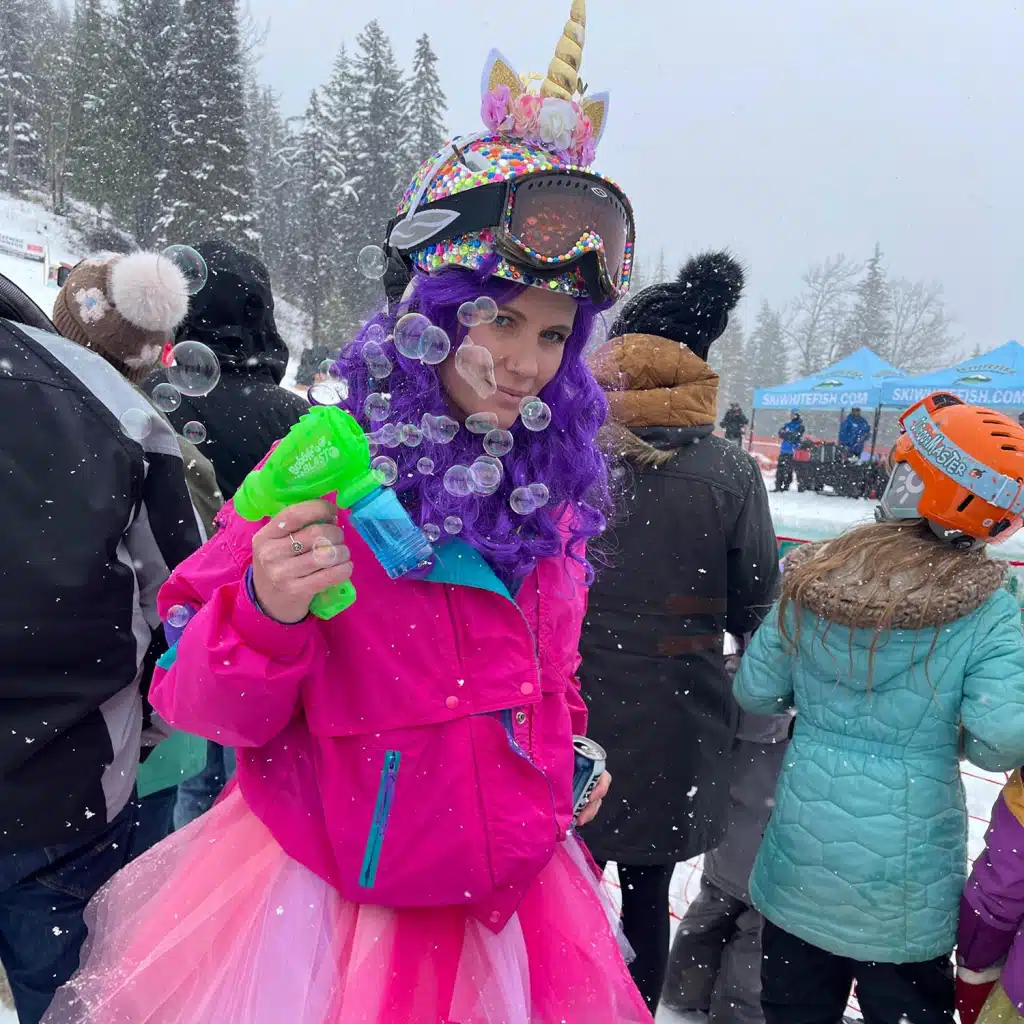 Picture of a woman at the pond skim for Whitefish Mountain Resort