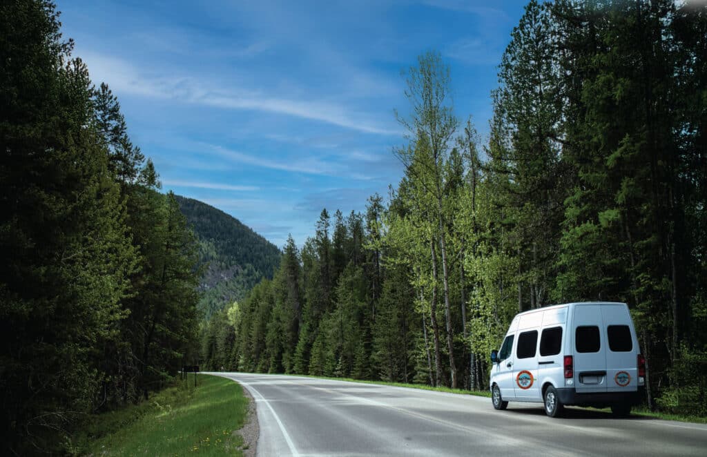 Tour Glacier transit van pictured on Going-to-the-Sun-Road in Glacier National Park